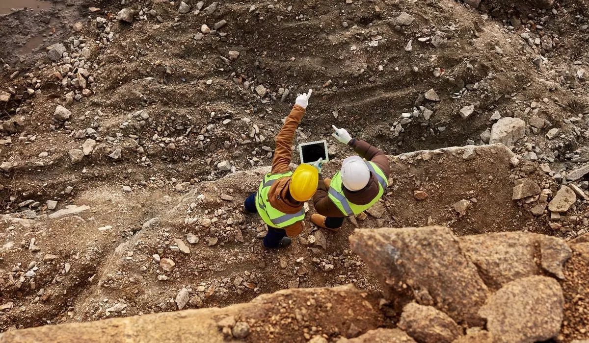 Workers inspecting site